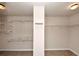 Carpeted walk-in closet featuring wire rack shelving at 2375 Walker Dr, Hampton, GA 30228