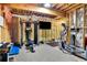 Unfinished basement setup as home gym with equipment, and exposed ceiling at 326 Carmichael Cir, Canton, GA 30115