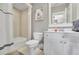 Bright bathroom featuring white vanity with a framed mirror, and a shower-tub combination at 326 Carmichael Cir, Canton, GA 30115