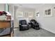 Bright sitting area with windows and two recliners at 326 Carmichael Cir, Canton, GA 30115