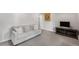 Finished basement with sofa and entertainment center. Perfect for relaxing and entertaining at 510 Birch Ridge Ct, Roswell, GA 30076