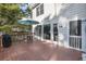 Spacious outdoor deck featuring a dining set and grill, ideal for outdoor entertaining and relaxation at 510 Birch Ridge Ct, Roswell, GA 30076