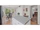 Bright eat-in kitchen featuring granite countertops, stainless steel appliances, and hardwood flooring at 510 Birch Ridge Ct, Roswell, GA 30076