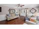 Comfortable living room with hardwood floors and stylish furnishings, perfect for entertaining at 510 Birch Ridge Ct, Roswell, GA 30076