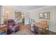 Office with hardwood floors, view of the stairway, leather chair, and writing desk at 510 Birch Ridge Ct, Roswell, GA 30076