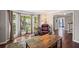 Cozy office space with hardwood floors, leather chair, desk, and view to outside at 510 Birch Ridge Ct, Roswell, GA 30076