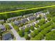 Aerial view of the home's location near the Silver Comet Trail, shown in a community with tree-lined streets at 5209 Carrington Park Dr, Powder Springs, GA 30127