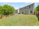 Backyard with a well-maintained lawn, ideal for relaxation and outdoor enjoyment at 5209 Carrington Park Dr, Powder Springs, GA 30127
