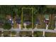 Aerial view highlighting the property's boundaries and surrounding greenery at 70 Summer Walk Dr, Covington, GA 30016