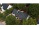 Aerial view of house, nestled among lush greenery at 70 Summer Walk Dr, Covington, GA 30016