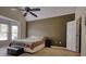 Primary bedroom with vaulted ceiling, bay window, and ensuite access at 70 Summer Walk Dr, Covington, GA 30016