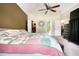 Spacious bedroom featuring a vaulted ceiling with easy access to a closet and ensuite bathroom at 70 Summer Walk Dr, Covington, GA 30016