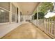 Relaxing covered front porch with swing, perfect for enjoying the outdoors at 70 Summer Walk Dr, Covington, GA 30016
