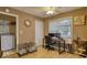 Flex room featuring a desk, two monitors, and access to laundry in the background at 70 Summer Walk Dr, Covington, GA 30016