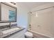 Bathroom featuring a shower and tub combination and granite countertop at 1718 Country Park Way, Lawrenceville, GA 30043