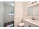 Bright bathroom with a modern vanity, stylish fixtures, and wainscoting accents at 1718 Country Park Way, Lawrenceville, GA 30043