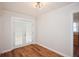 Bright dining room with wood floors and double glass doors at 2179 Jernigan Drive Se Dr, Atlanta, GA 30315