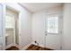 Mud room featuring hardwood floors, exterior access, and bathroom with shower at 2179 Jernigan Drive Se Dr, Atlanta, GA 30315
