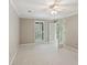 Spacious bedroom featuring carpeted floors, neutral walls and multiple windows for ample light at 23101 Plantation Ne Dr, Atlanta, GA 30324