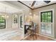 Quaint breakfast nook featuring a bar and a view into the chandelier-lit dining room at 23101 Plantation Ne Dr, Atlanta, GA 30324
