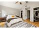 Spacious main bedroom with ensuite, hardwood floors, vaulted ceilings, and plenty of closet space at 4727 Emily Sw Dr, Lilburn, GA 30047