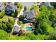 Private backyard oasis with pool, patio, lush landscaping, and detached garage with lots of privacy at 844 Nob Ridge Dr, Marietta, GA 30064
