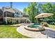 Expansive backyard featuring a pool, hot tub, patio, and multi-level deck perfect for entertaining and relaxing at 844 Nob Ridge Dr, Marietta, GA 30064