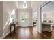 Welcoming foyer boasts hardwood floors, soaring ceilings, and views into adjacent living spaces at 844 Nob Ridge Dr, Marietta, GA 30064