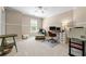 Spacious home office with a desk setup and a cozy reading corner by the window at 844 Nob Ridge Dr, Marietta, GA 30064