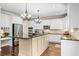 Modern kitchen featuring stainless steel appliances, granite countertops, an island, and plenty of storage at 844 Nob Ridge Dr, Marietta, GA 30064