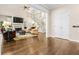 Spacious living room with soaring ceilings, hardwood floors, and a cozy fireplace at 844 Nob Ridge Dr, Marietta, GA 30064