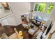 Open-concept living room with high ceilings, large windows, and a view of the pool at 844 Nob Ridge Dr, Marietta, GA 30064