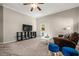 The cozy living space features neutral walls and carpet, comfortable furnishings, and access to the backyard at 844 Nob Ridge Dr, Marietta, GA 30064