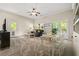 A versatile living space offers room for dining and lounging with lots of natural light and backyard access at 844 Nob Ridge Dr, Marietta, GA 30064