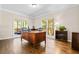 Bright and airy home office with hardwood floors and views of the outdoors at 844 Nob Ridge Dr, Marietta, GA 30064