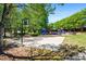 Community playground with basketball court and seating at 844 Nob Ridge Dr, Marietta, GA 30064