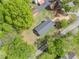 An aerial view of a house surrounded by lush greenery, showcasing its setting at 1809 Cassville Nw Rd, Cartersville, GA 30121