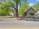 A charming home with a well-maintained exterior is set back from the street, near a vintage building at 1809 Cassville Nw Rd, Cartersville, GA 30121