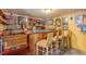 Finished basement featuring a full bar, shelving and seating at 2733 Winburn Ter, East Point, GA 30344