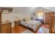 Bedroom featuring hardwood floors, light colored walls, and natural light at 2733 Winburn Ter, East Point, GA 30344