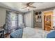 Serene bedroom with hardwood floors, soft lighting, and cozy decor accents at 2733 Winburn Ter, East Point, GA 30344