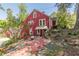 Charming two-story home featuring a cozy front patio and landscaped front yard at 2733 Winburn Ter, East Point, GA 30344