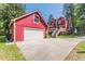 Spacious garage with ample parking space and exterior access to the home's deck at 2733 Winburn Ter, East Point, GA 30344