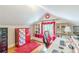 Bright home office featuring built-in shelving, storage, natural light and a hardwood floor at 2733 Winburn Ter, East Point, GA 30344