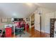 Home office featuring built-in shelving, storage, natural light and a hardwood floor at 2733 Winburn Ter, East Point, GA 30344
