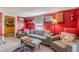 Bright living room with comfortable seating and unique skull pillows at 2733 Winburn Ter, East Point, GA 30344