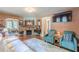 Comfortable living room features a stone fireplace, hardwood floors, and stylish seating at 2733 Winburn Ter, East Point, GA 30344