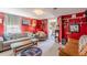 Comfortable living room with ample seating and bright red walls at 2733 Winburn Ter, East Point, GA 30344