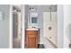 Bathroom featuring wood vanity, standup shower, and light gray walls at 2958 Paul Harris Rd, Dallas, GA 30157