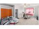 Bedroom featuring neutral carpet, window with pink curtains, and a drum set at 2958 Paul Harris Rd, Dallas, GA 30157
